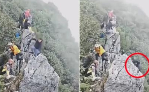 登“刀片岩”还看手机，小伙坠崖